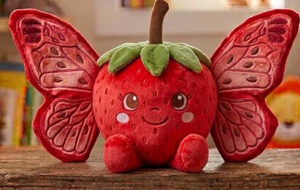 RuhPlush concept render — a plush strawberry with embroidered butterfly wings