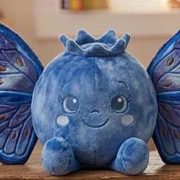 Blueberry concept render — a plush blueberry with embroidered butterfly wings